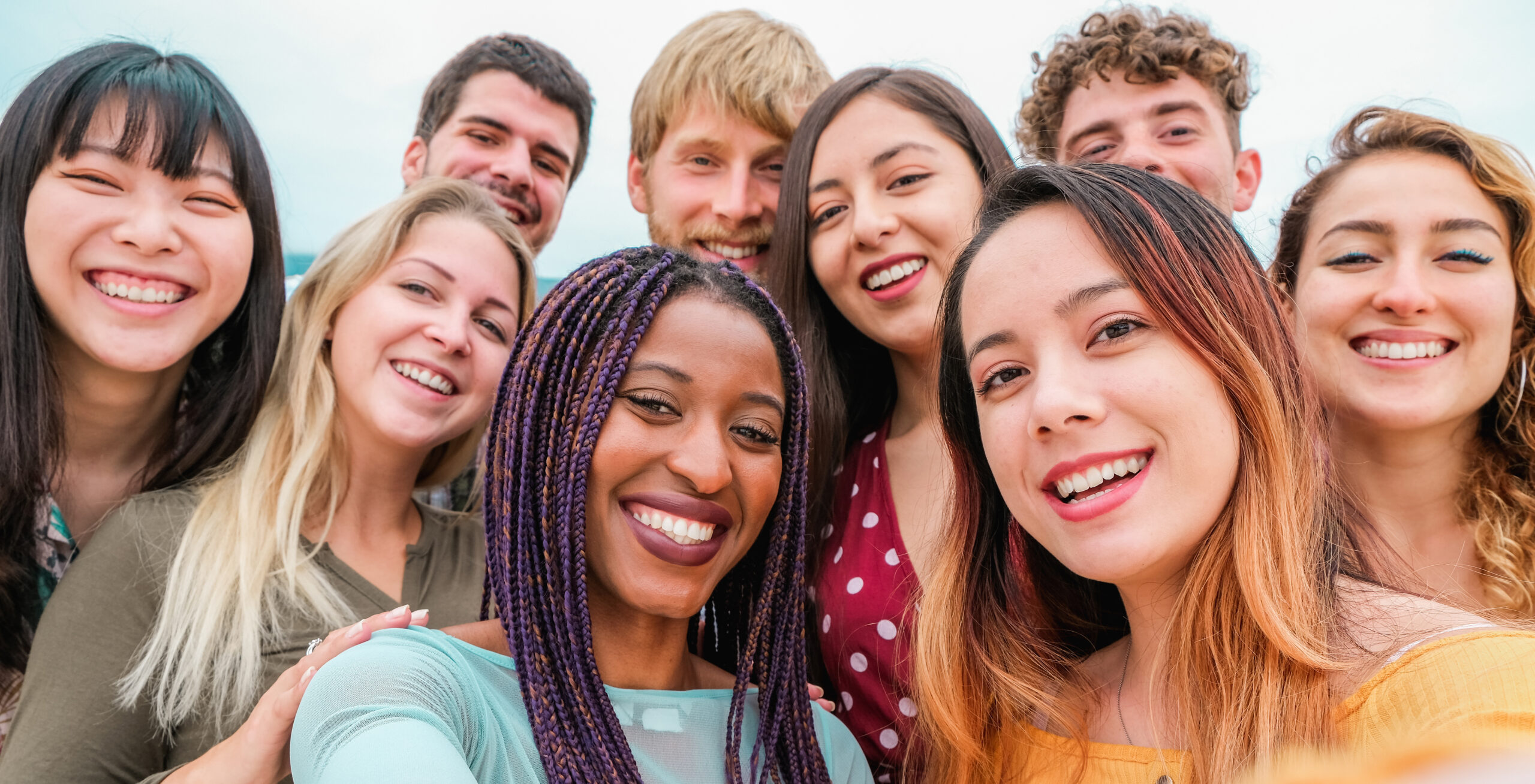 young friends from diverse cultures races taking photo making happy faces youth millennial generation friendship concept with students people having fun together focus close up girls scaled